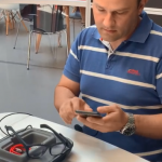 Man setting up eye tracking glasses