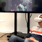 Man seated on bean bag with VR headset