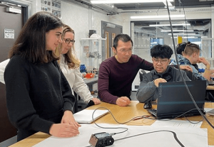 Engineering students around a table