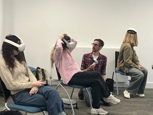 3 students wearing VR headsets