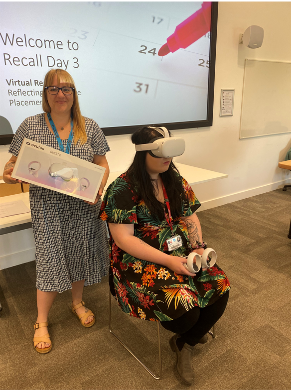 Josie with student Molly wearing a VR headset