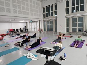 Yoga practice led by Dr Hecquet