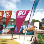 BU bunting at Talbot Campus on a sunny day
