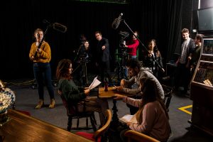 Students filming a show
