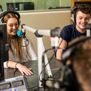 Two students in the media studios at BU