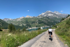 BU student Tom is riding his bike in the French Alps on a sunny day