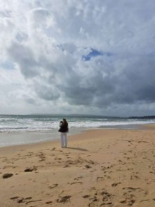 woman stood on a beach