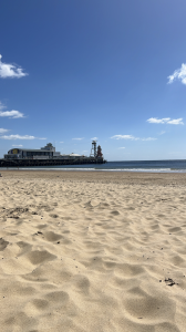 Bournemouth beach on a sunny day with the pier in the background