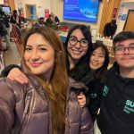 Group of friends smiling together on campus for Cecilia’s blog