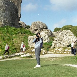 Osher posing for a picture in a natural landscape