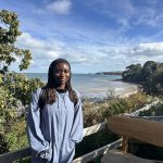 Josephine posing for a picture at the beach
