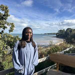 Josephine posing for a picture at the beach
