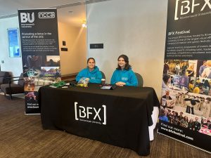 Osher and another Student Ambassador working at the BFX event.
